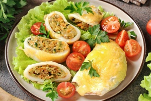 Кальмары фаршированные кабачками в духовке