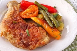 Куриные окорочка запеченные с овощами
